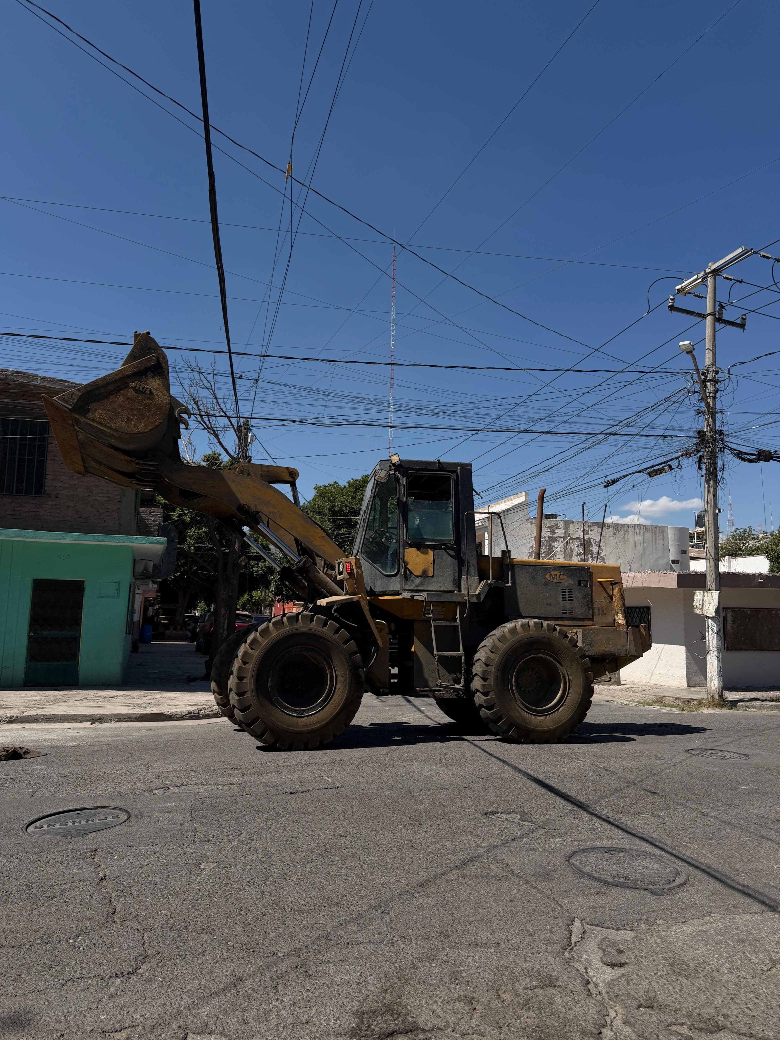 Cargador frontal en sitio de trabajo